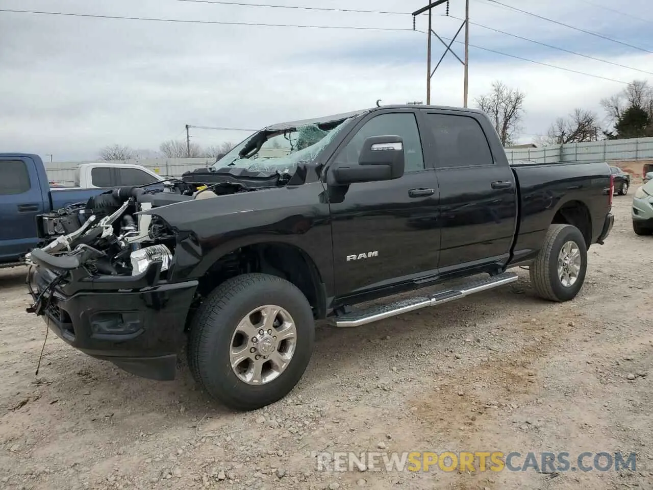 1 Photograph of a damaged car 3C6UR5DJ9RG386229 RAM 2500 2024
