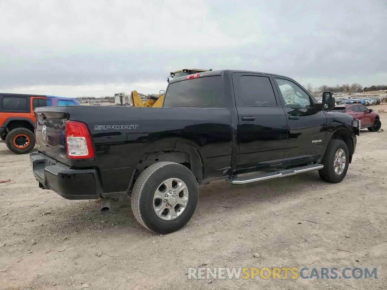 3 Photograph of a damaged car 3C6UR5DJ9RG386229 RAM 2500 2024