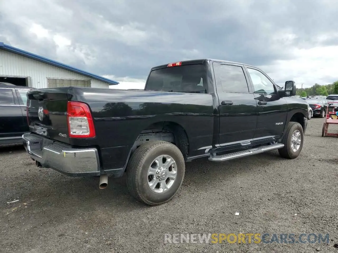 3 Photograph of a damaged car 3C6UR5DJXRG249736 RAM 2500 2024