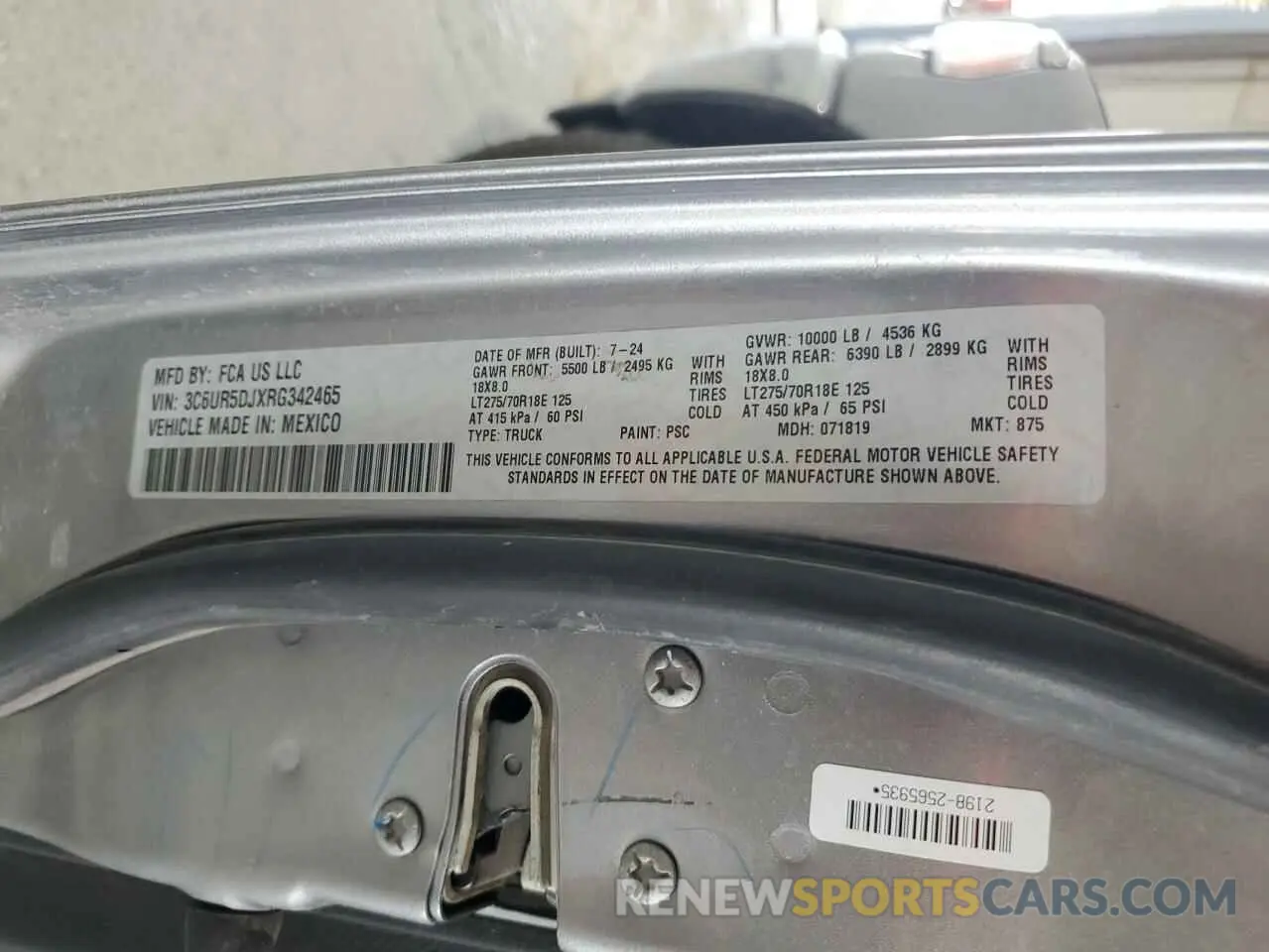 12 Photograph of a damaged car 3C6UR5DJXRG342465 RAM 2500 2024