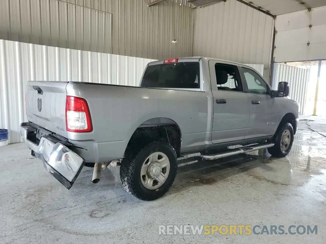 3 Photograph of a damaged car 3C6UR5DJXRG342465 RAM 2500 2024