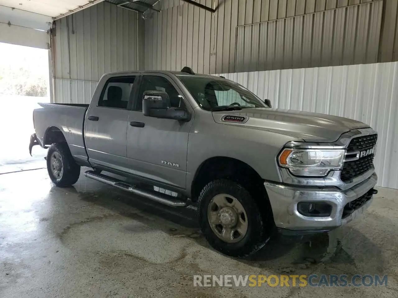4 Photograph of a damaged car 3C6UR5DJXRG342465 RAM 2500 2024