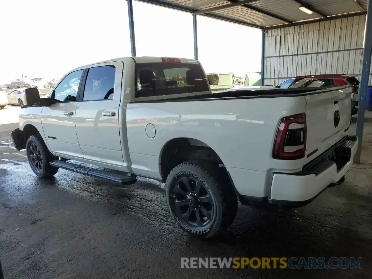 2 Photograph of a damaged car 3C6UR5DJXRG394369 RAM 2500 2024