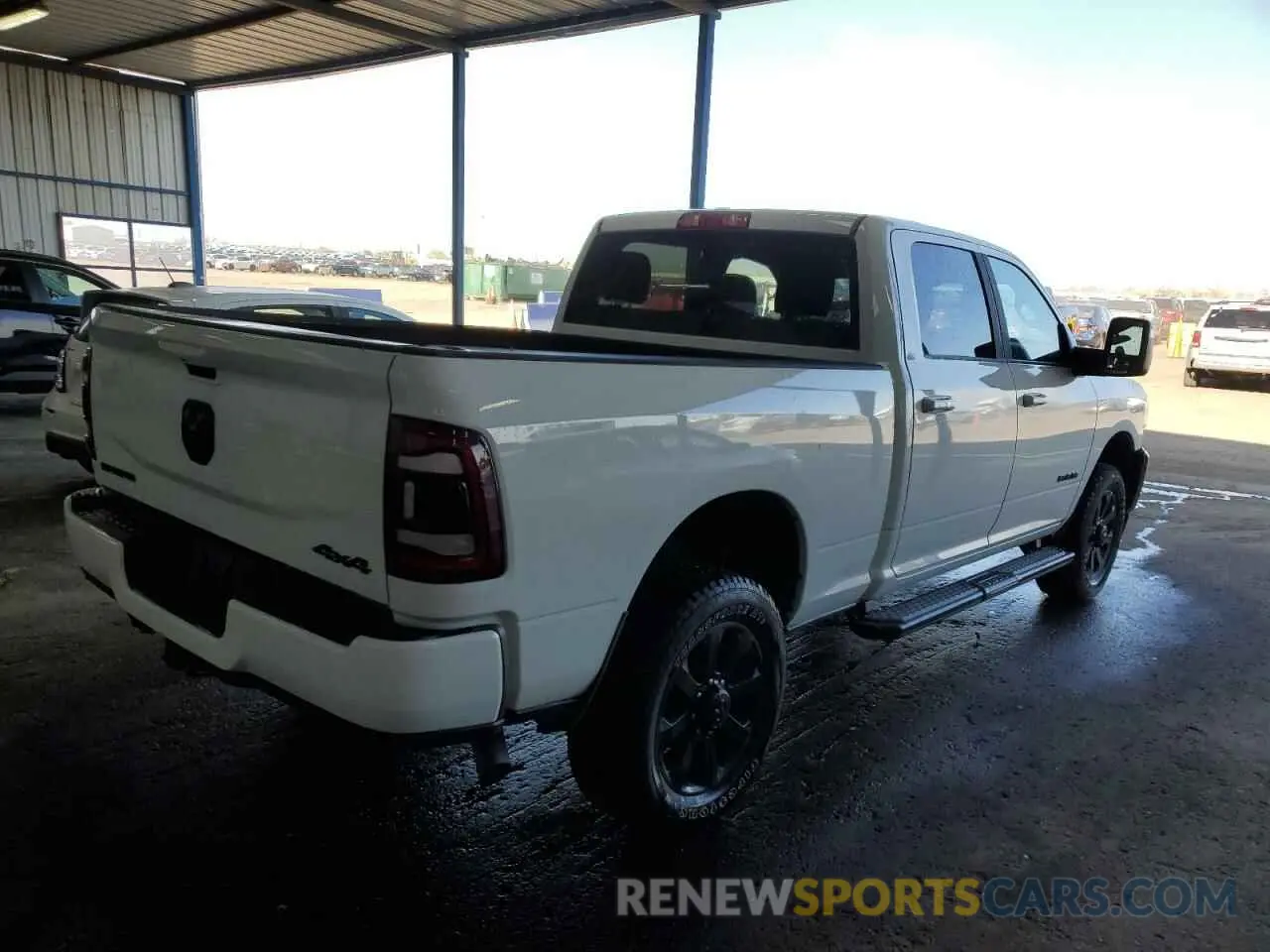 3 Photograph of a damaged car 3C6UR5DJXRG394369 RAM 2500 2024