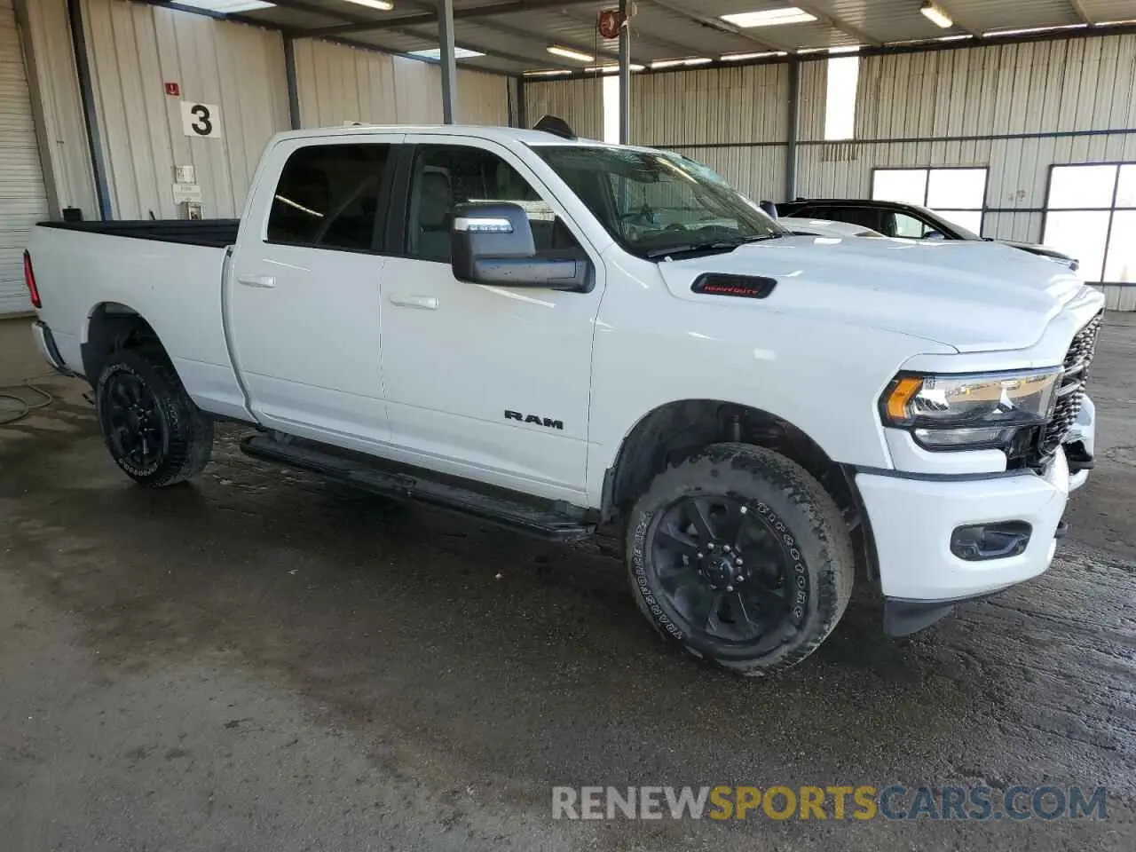 4 Photograph of a damaged car 3C6UR5DJXRG394369 RAM 2500 2024