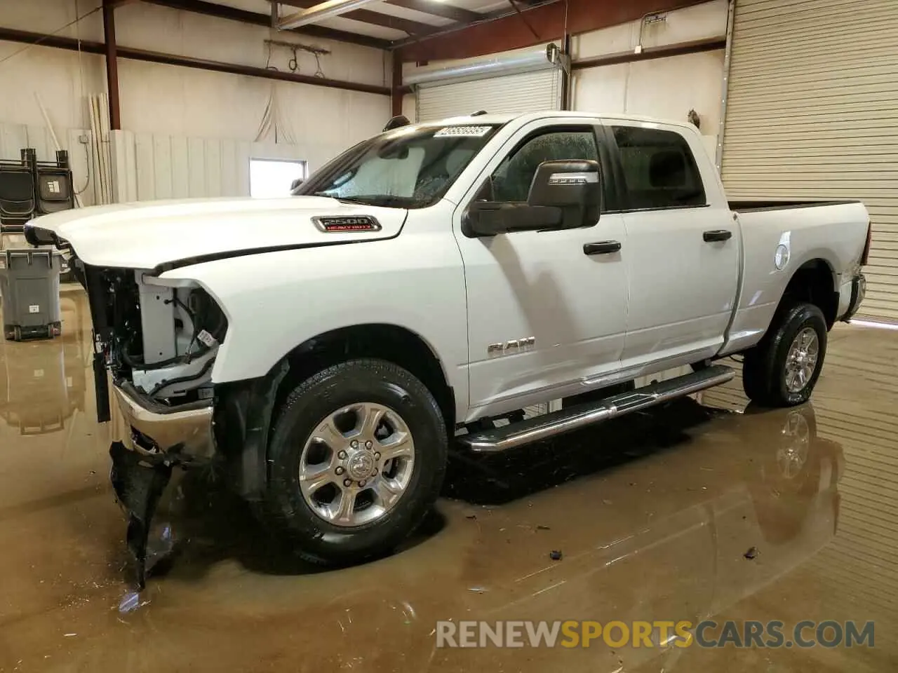 1 Photograph of a damaged car 3C6UR5DJXRG394811 RAM 2500 2024