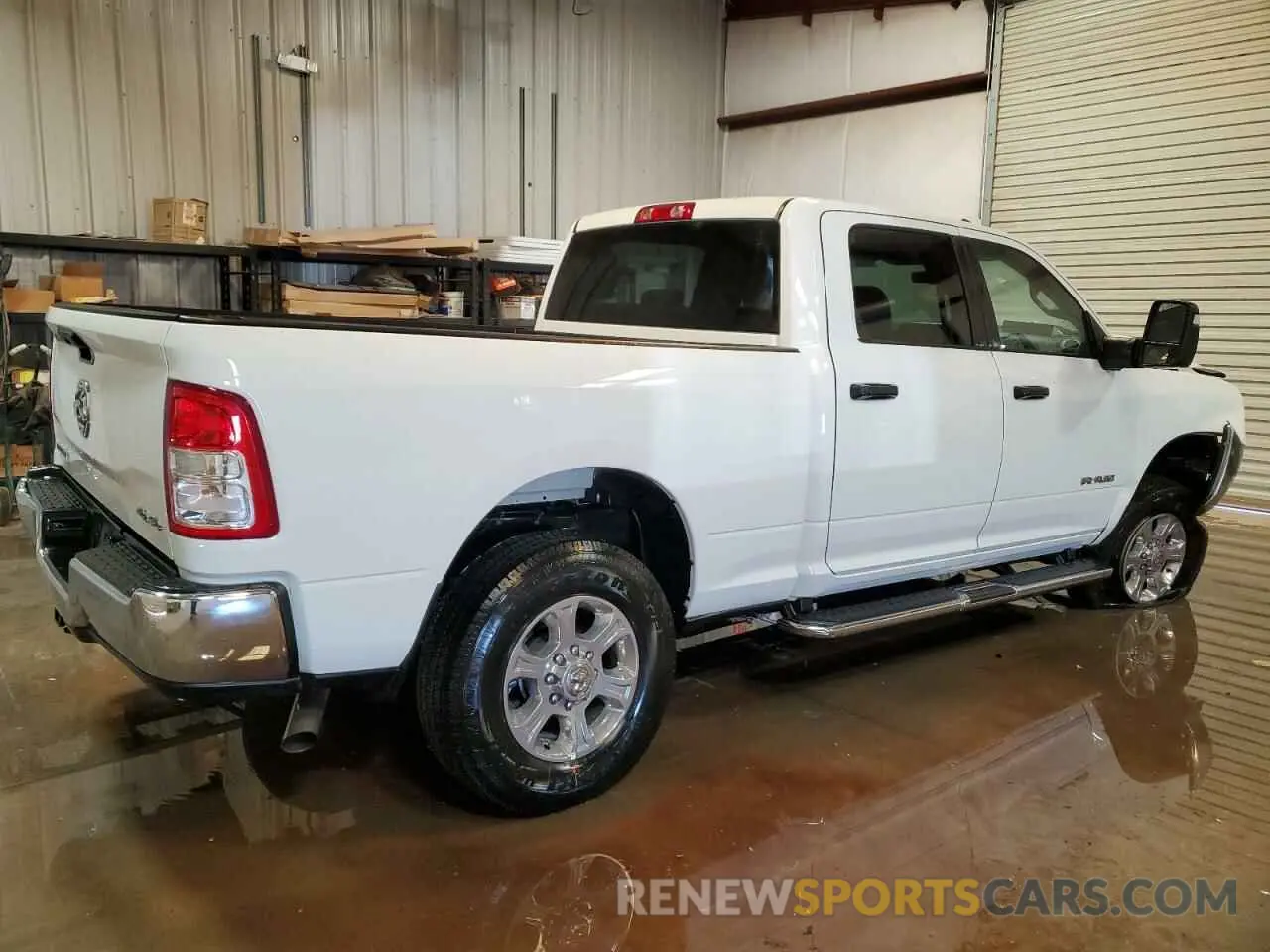 3 Photograph of a damaged car 3C6UR5DJXRG394811 RAM 2500 2024