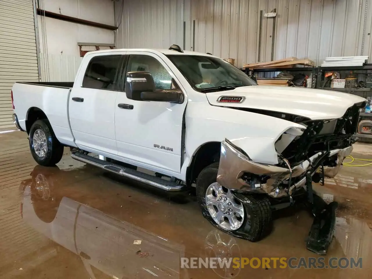 4 Photograph of a damaged car 3C6UR5DJXRG394811 RAM 2500 2024