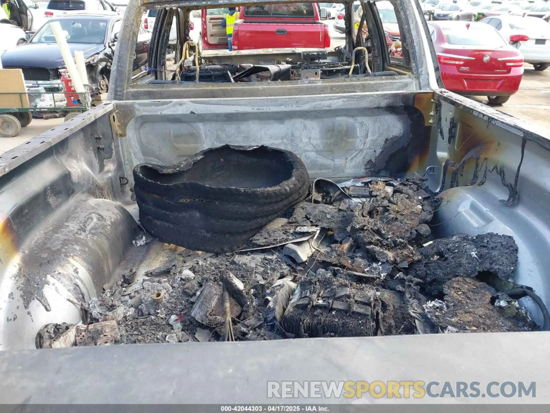 11 Photograph of a damaged car 3C6UR5DL0RG102178 RAM 2500 2024