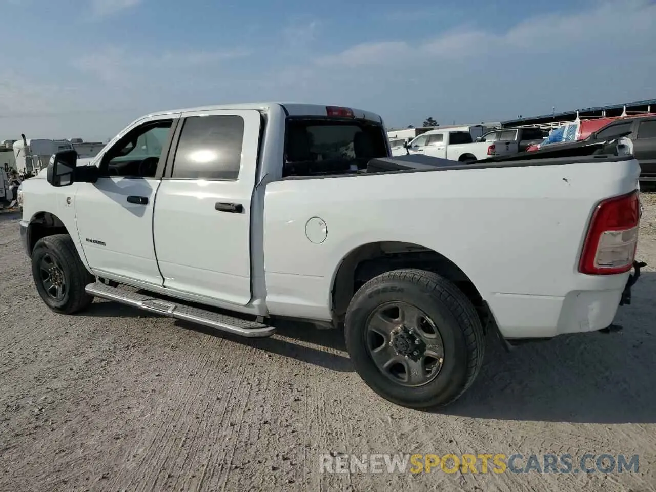 3 Photograph of a damaged car 3C6UR5DL0RG176975 RAM 2500 2024