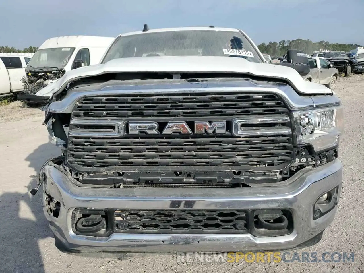 9 Photograph of a damaged car 3C6UR5DL0RG176975 RAM 2500 2024