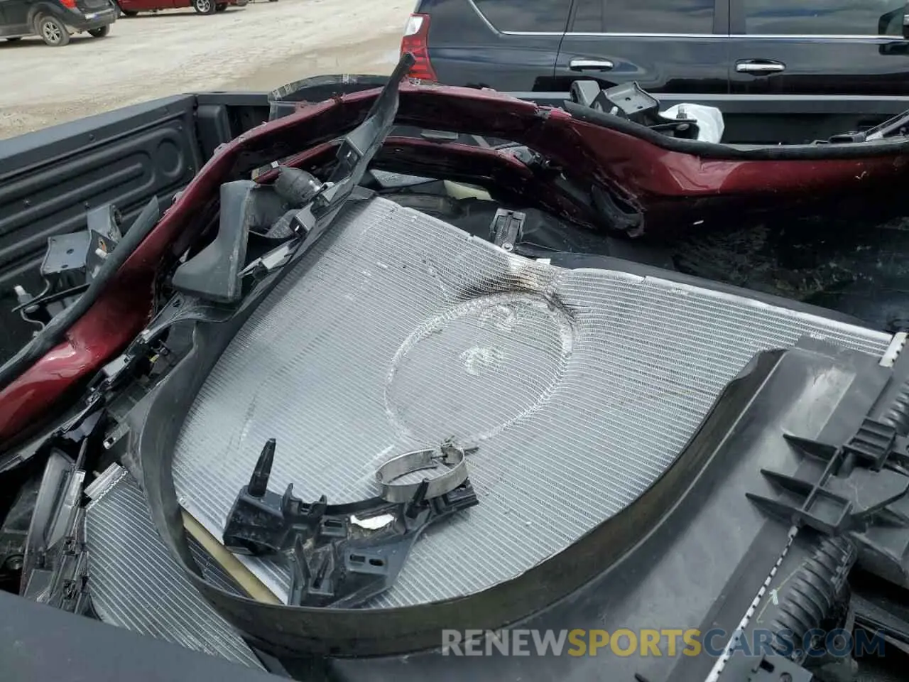 12 Photograph of a damaged car 3C6UR5DL0RG247012 RAM 2500 2024