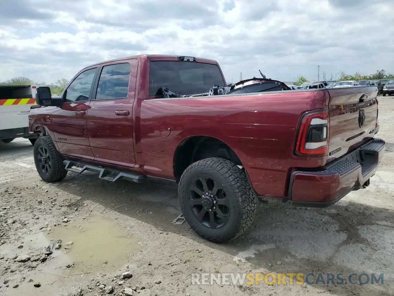 2 Photograph of a damaged car 3C6UR5DL0RG247012 RAM 2500 2024