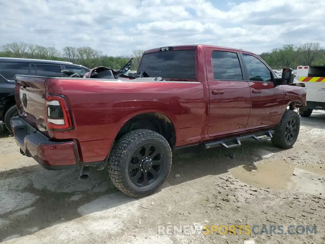 3 Photograph of a damaged car 3C6UR5DL0RG247012 RAM 2500 2024