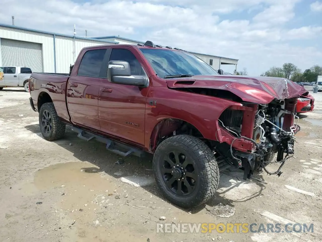 4 Photograph of a damaged car 3C6UR5DL0RG247012 RAM 2500 2024