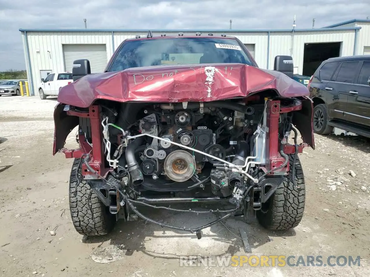 5 Photograph of a damaged car 3C6UR5DL0RG247012 RAM 2500 2024