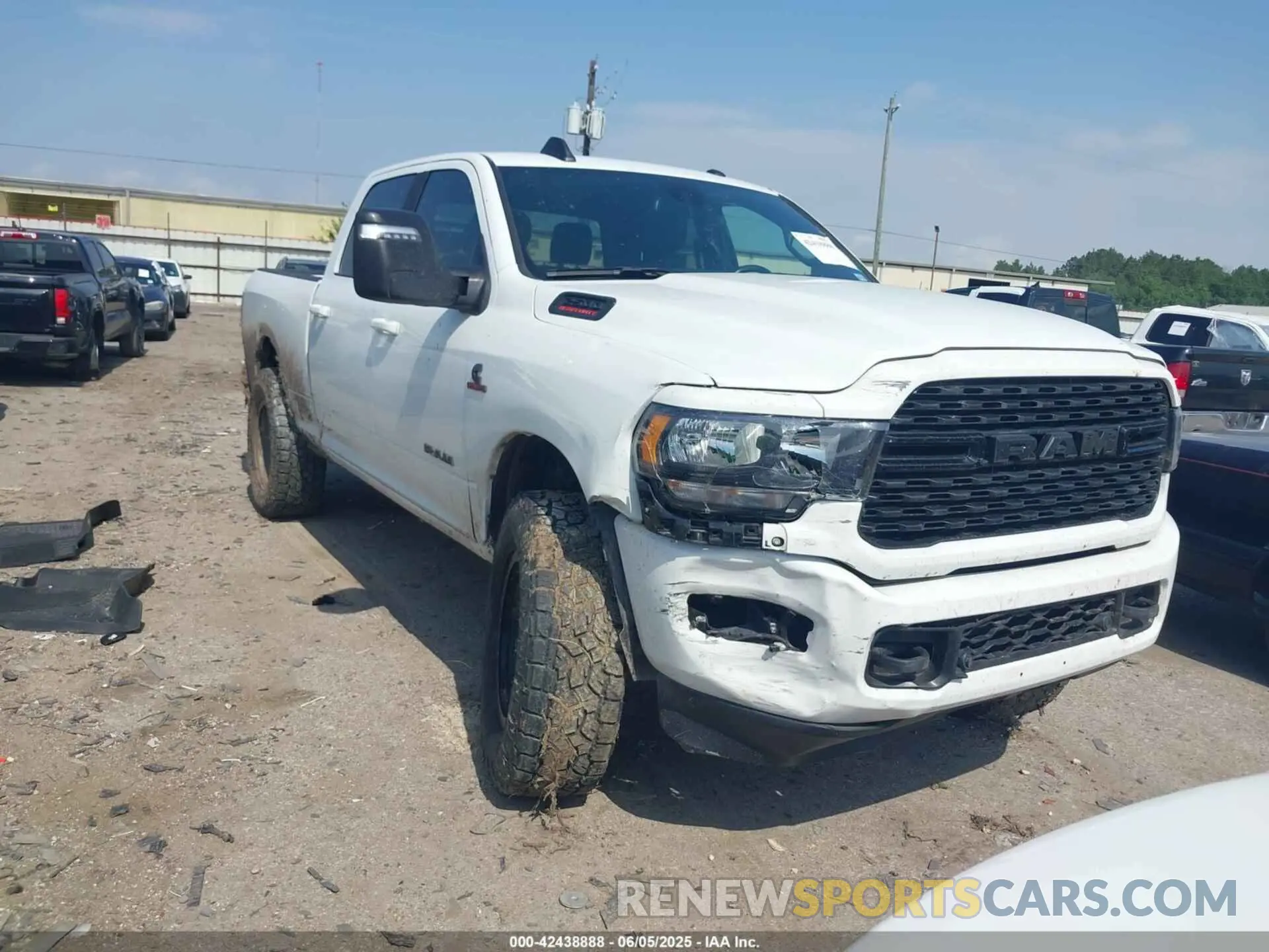 1 Photograph of a damaged car 3C6UR5DL0RG247091 RAM 2500 2024