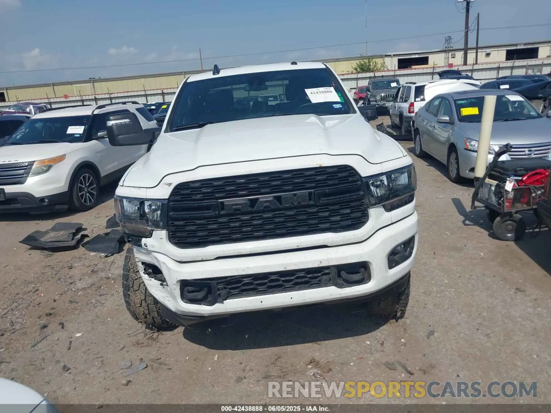 11 Photograph of a damaged car 3C6UR5DL0RG247091 RAM 2500 2024