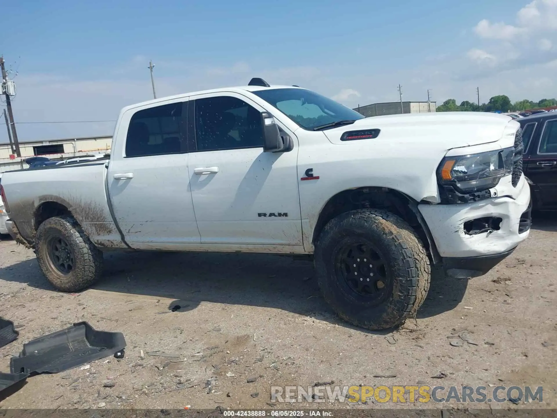 12 Photograph of a damaged car 3C6UR5DL0RG247091 RAM 2500 2024