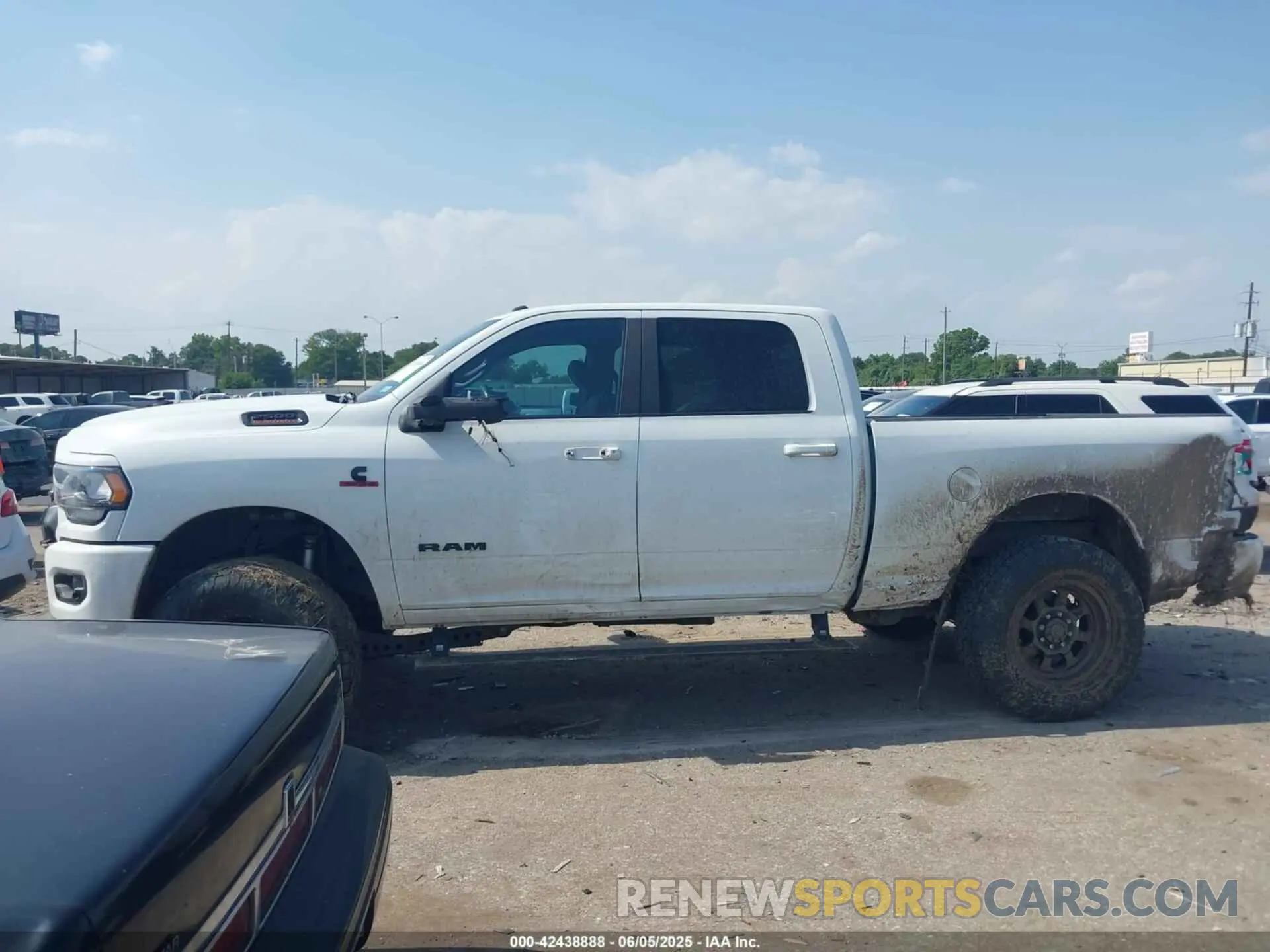 13 Photograph of a damaged car 3C6UR5DL0RG247091 RAM 2500 2024