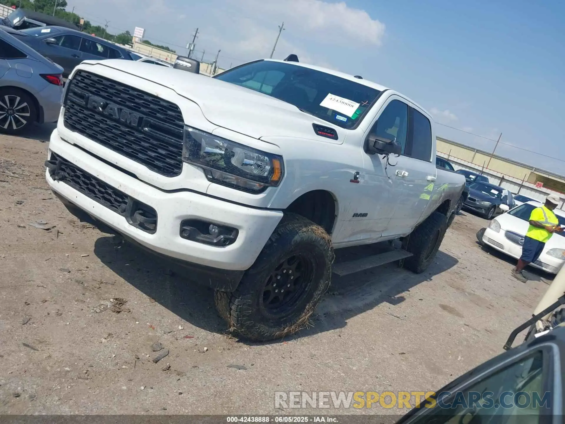 2 Photograph of a damaged car 3C6UR5DL0RG247091 RAM 2500 2024