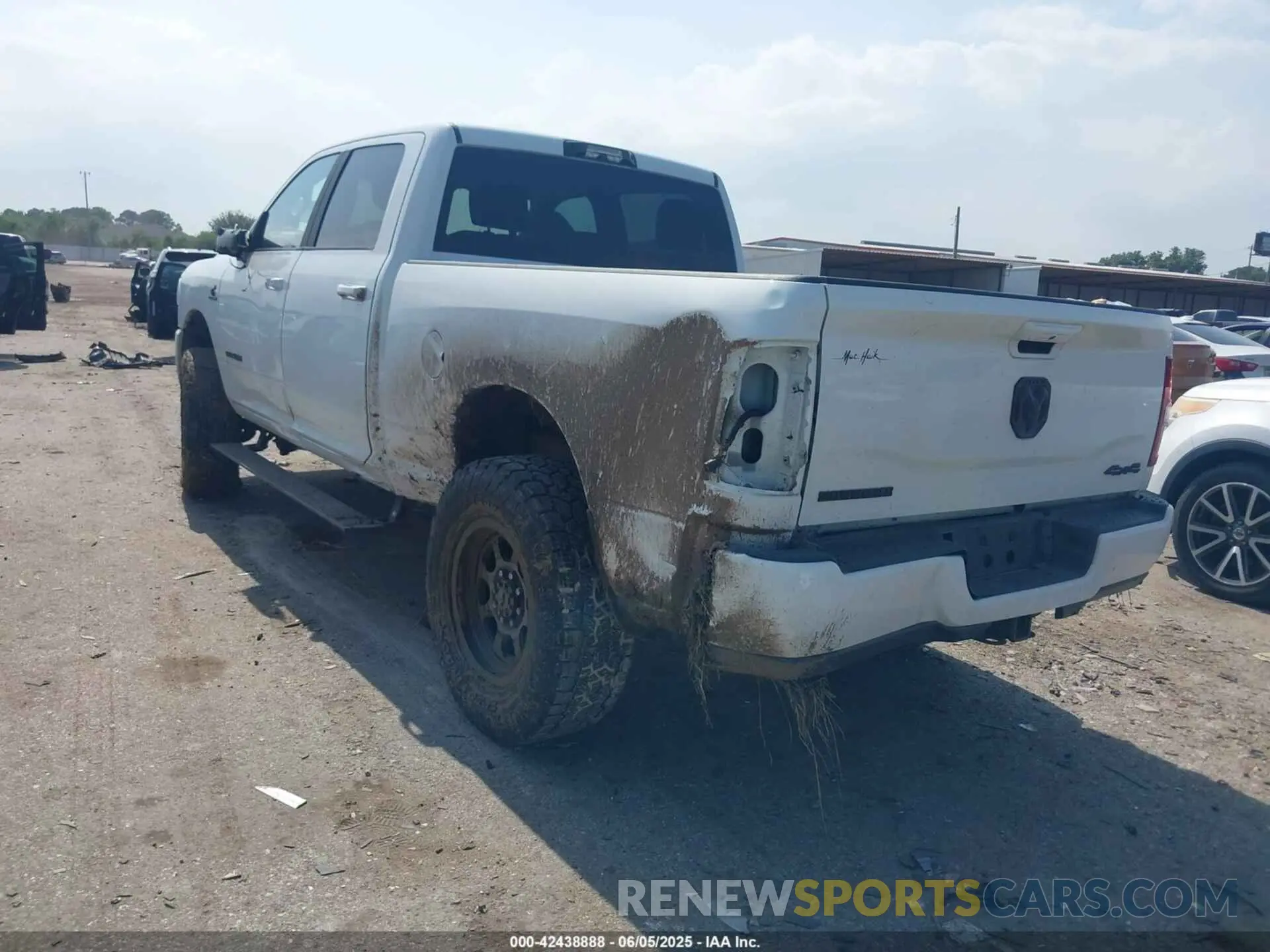 3 Photograph of a damaged car 3C6UR5DL0RG247091 RAM 2500 2024