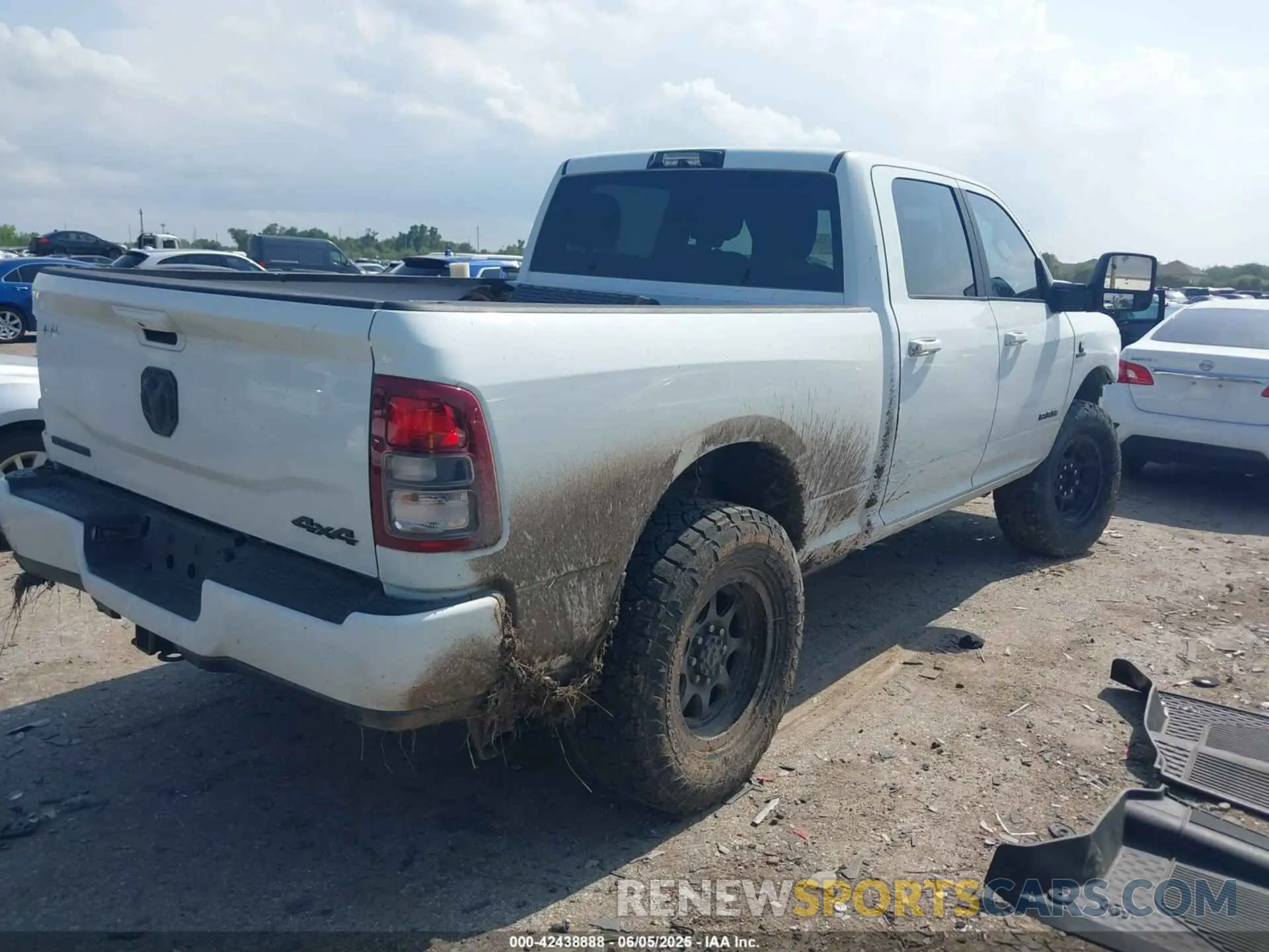 4 Photograph of a damaged car 3C6UR5DL0RG247091 RAM 2500 2024