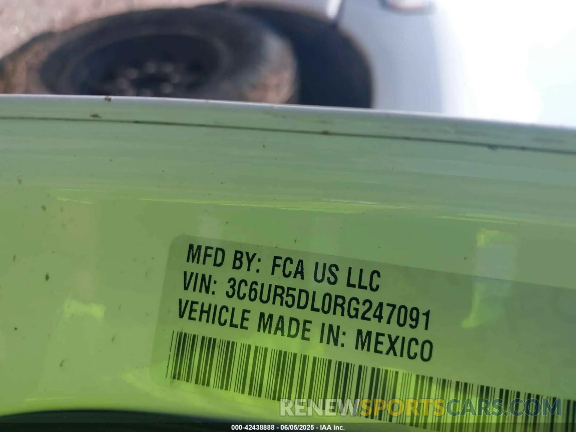 9 Photograph of a damaged car 3C6UR5DL0RG247091 RAM 2500 2024