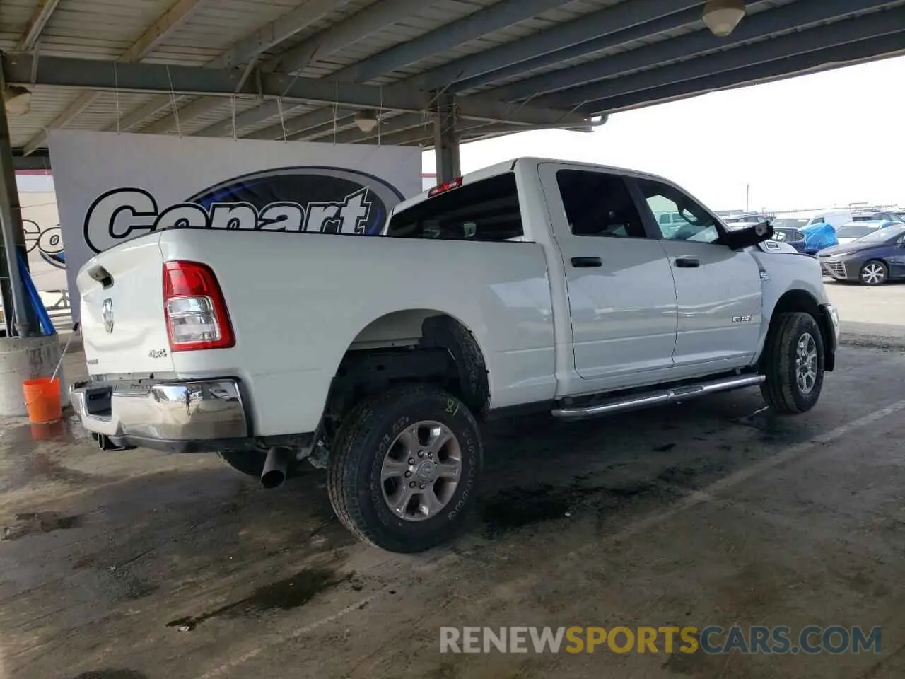 3 Photograph of a damaged car 3C6UR5DL0RG336465 RAM 2500 2024
