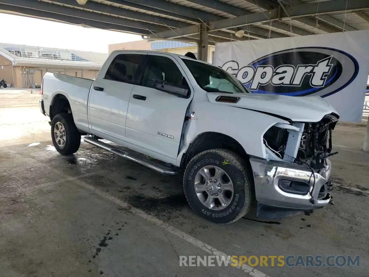 4 Photograph of a damaged car 3C6UR5DL0RG336465 RAM 2500 2024