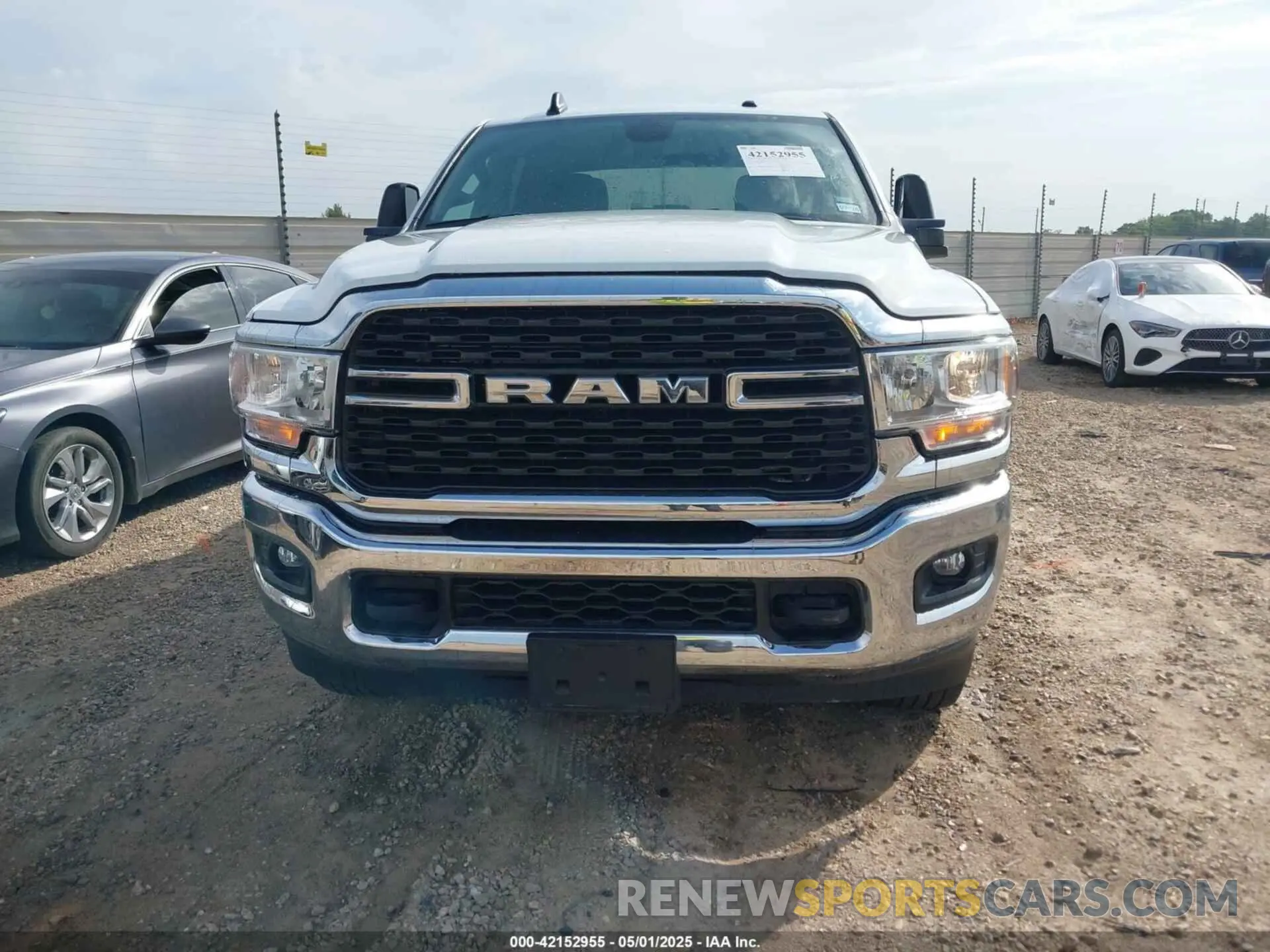 12 Photograph of a damaged car 3C6UR5DL0RG339978 RAM 2500 2024