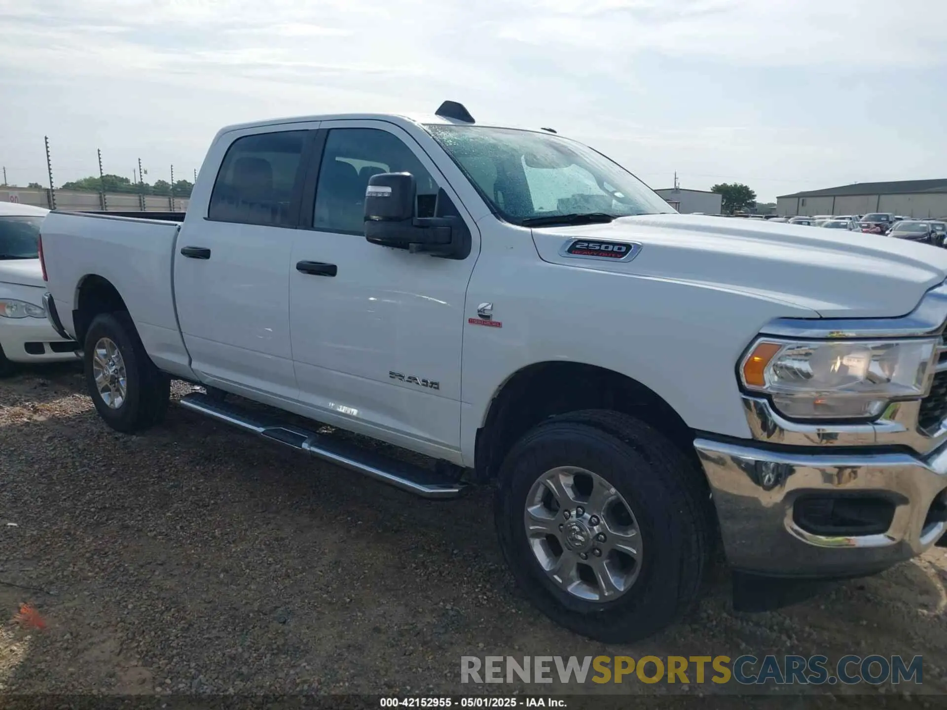 13 Photograph of a damaged car 3C6UR5DL0RG339978 RAM 2500 2024