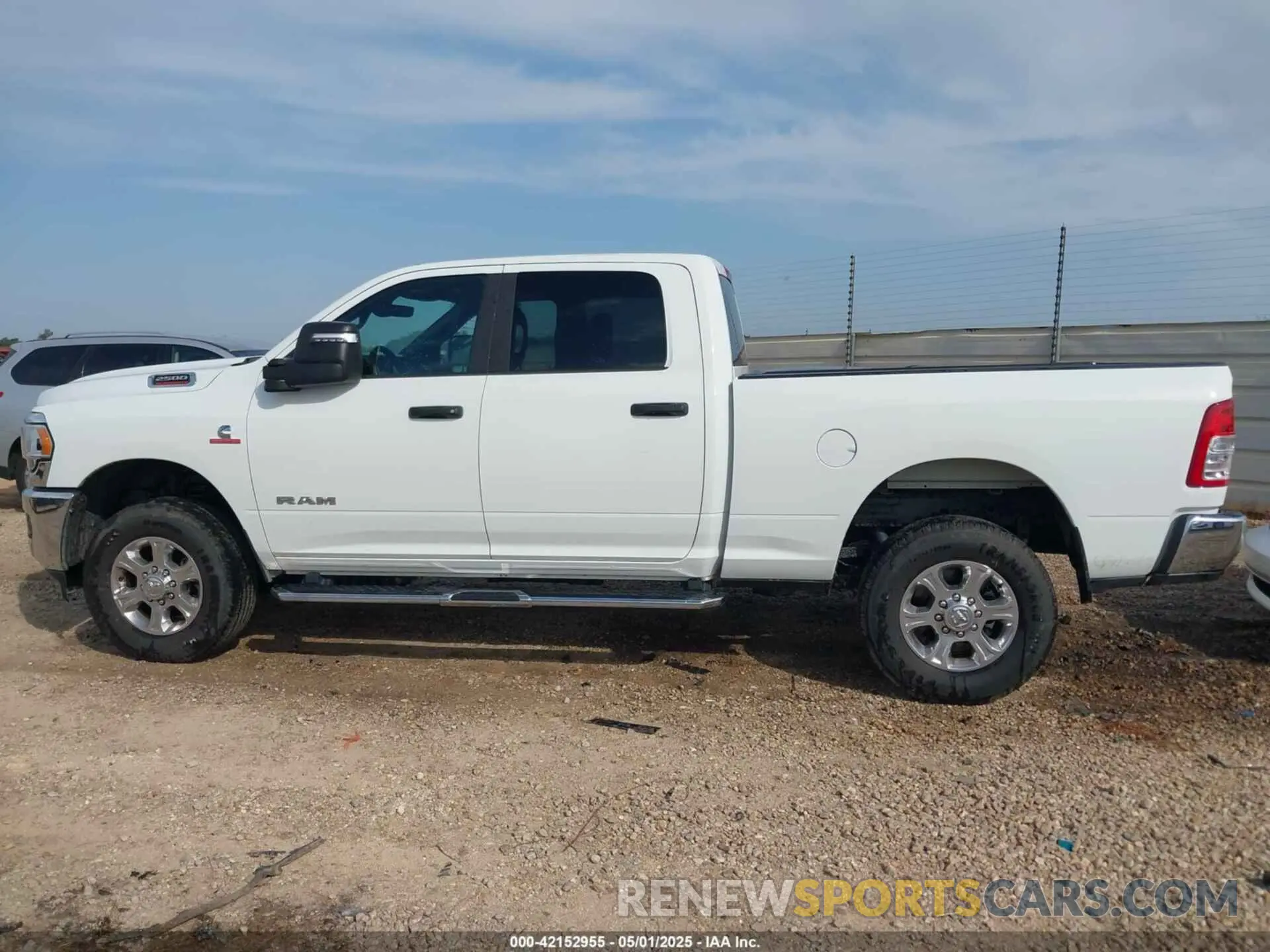 14 Photograph of a damaged car 3C6UR5DL0RG339978 RAM 2500 2024