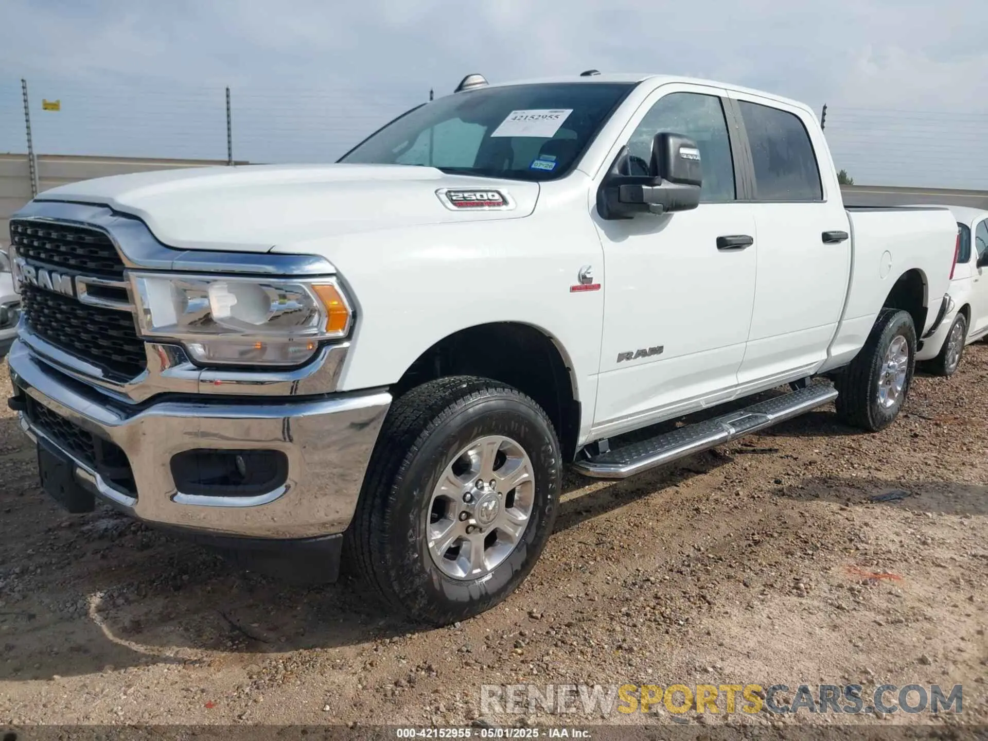 2 Photograph of a damaged car 3C6UR5DL0RG339978 RAM 2500 2024
