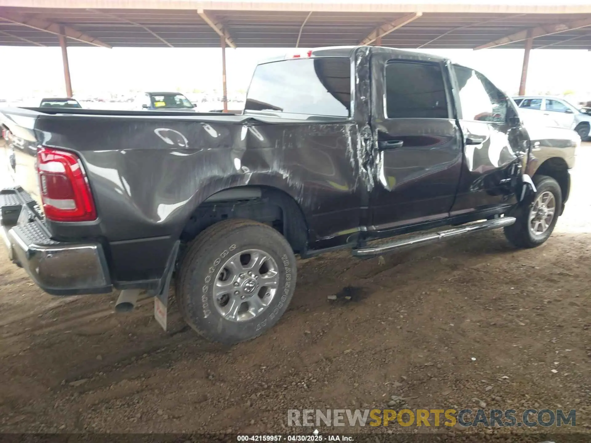 4 Photograph of a damaged car 3C6UR5DL1RG105526 RAM 2500 2024