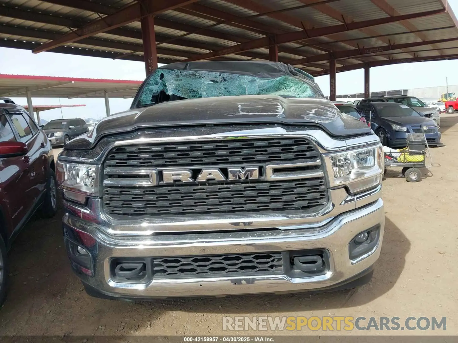 6 Photograph of a damaged car 3C6UR5DL1RG105526 RAM 2500 2024