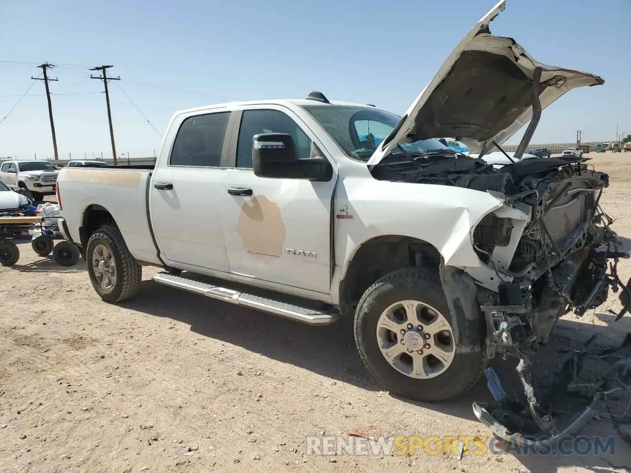 4 Photograph of a damaged car 3C6UR5DL1RG106160 RAM 2500 2024