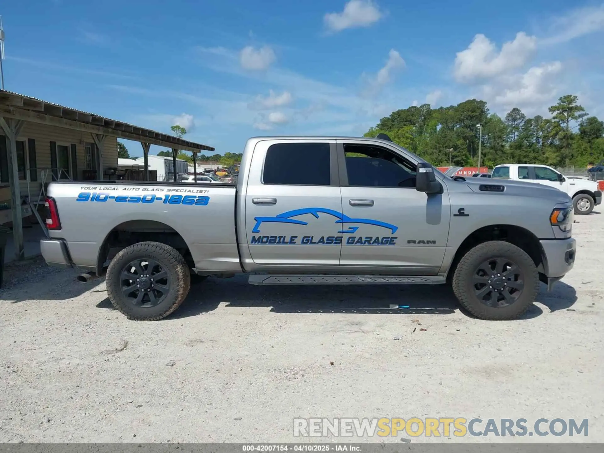 13 Photograph of a damaged car 3C6UR5DL1RG116185 RAM 2500 2024