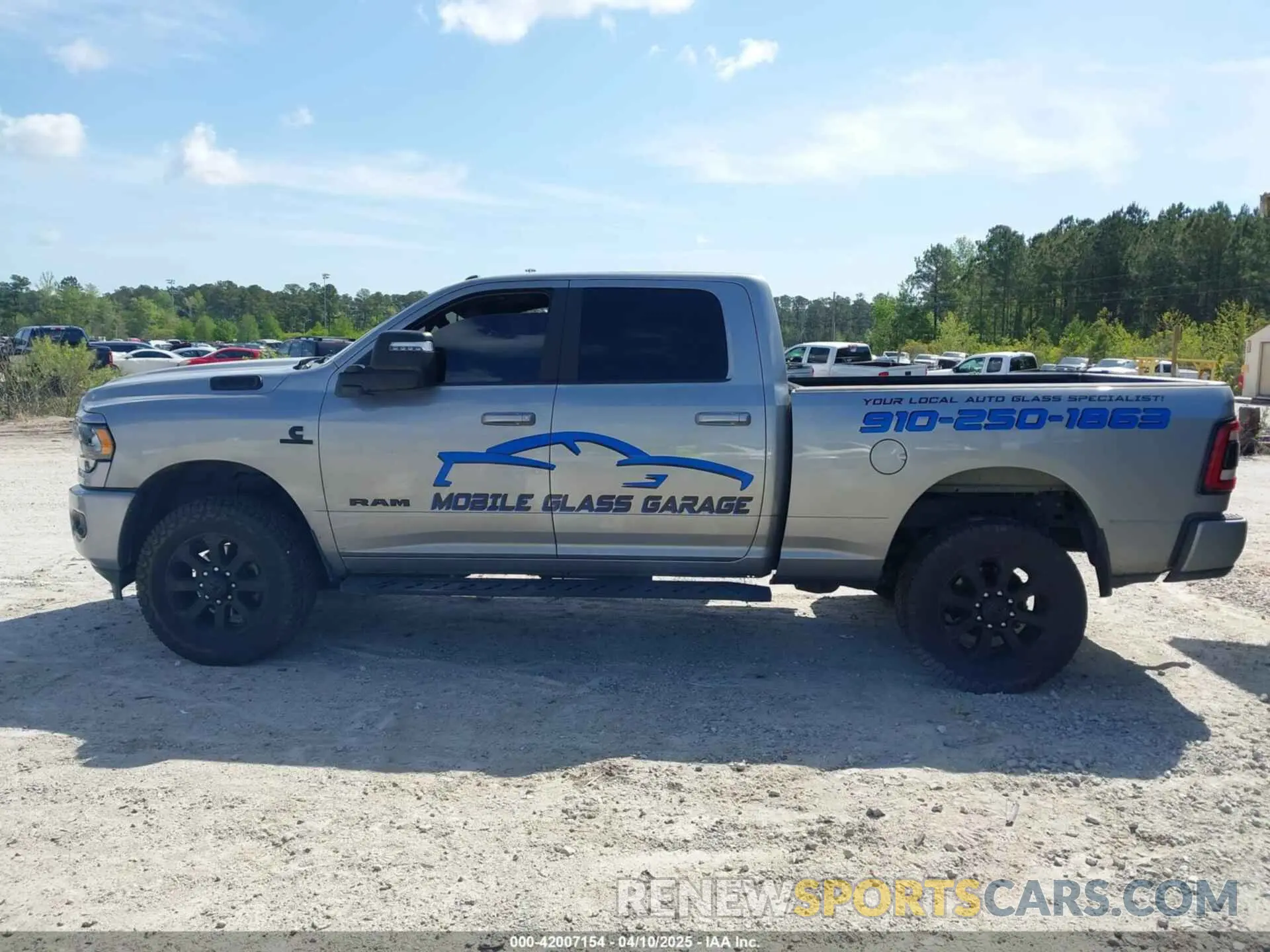 14 Photograph of a damaged car 3C6UR5DL1RG116185 RAM 2500 2024