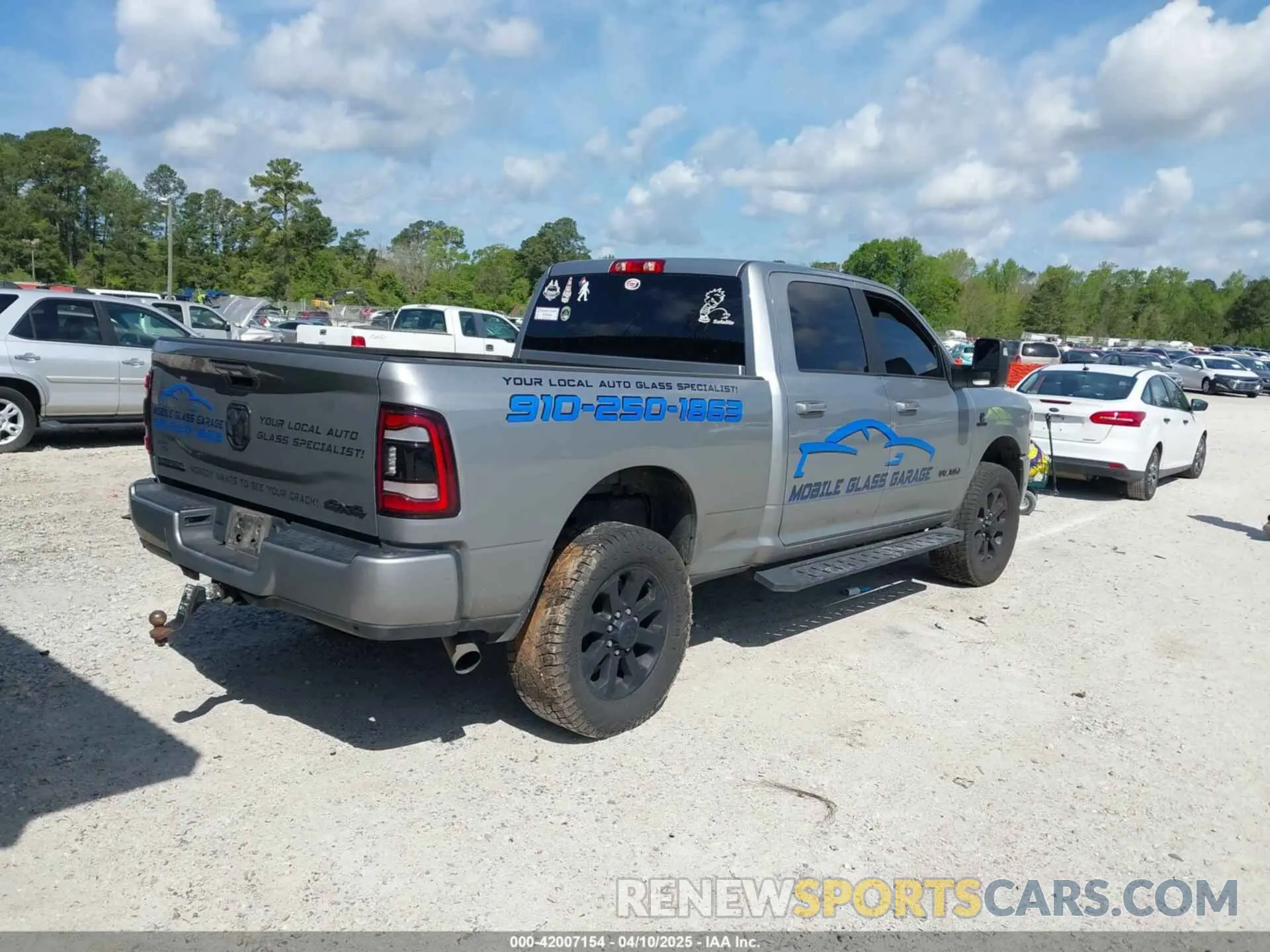 4 Photograph of a damaged car 3C6UR5DL1RG116185 RAM 2500 2024