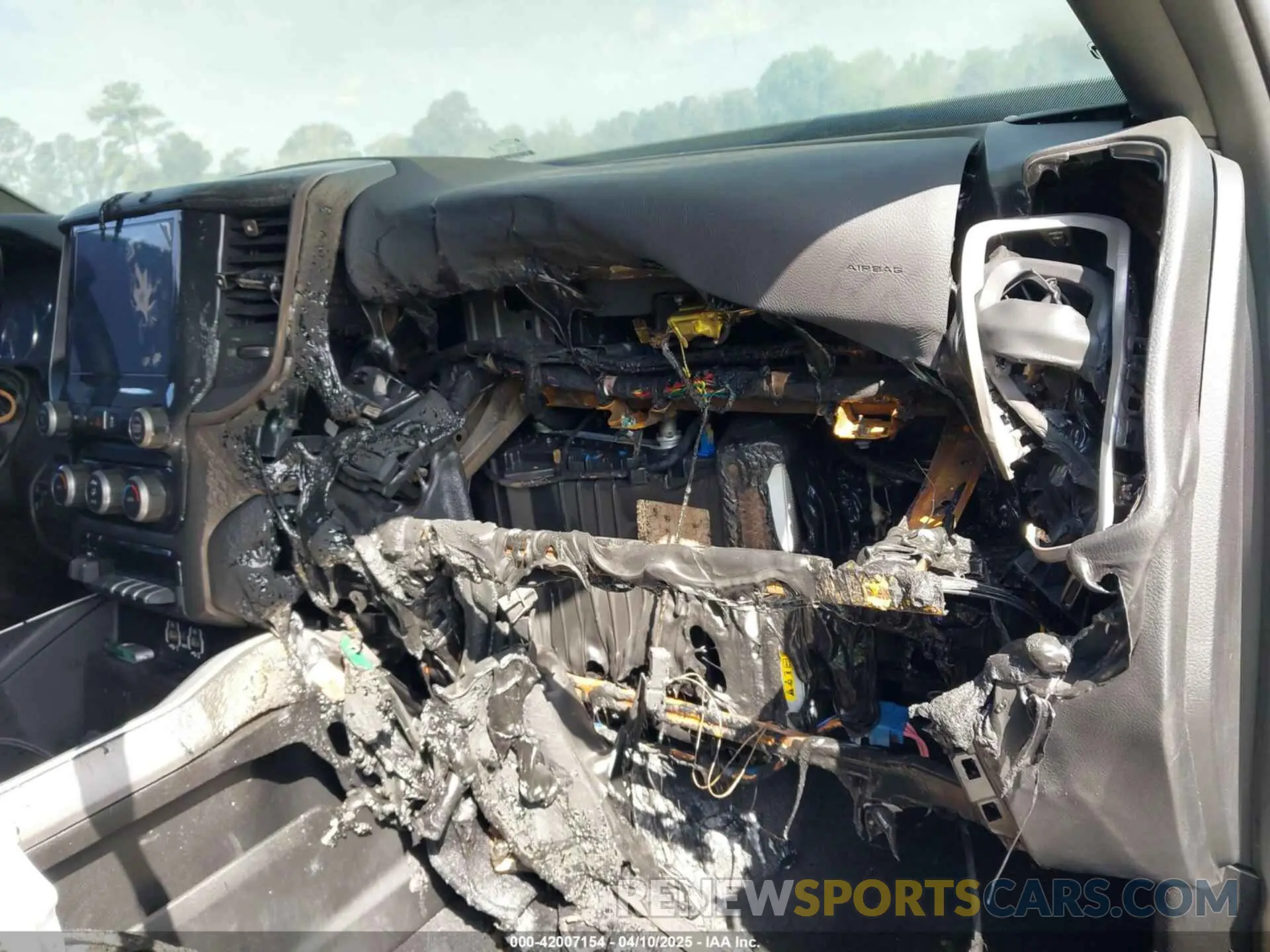 6 Photograph of a damaged car 3C6UR5DL1RG116185 RAM 2500 2024