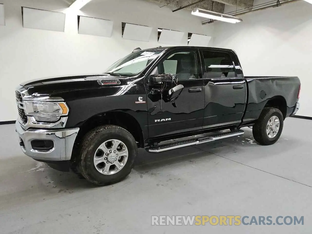 1 Photograph of a damaged car 3C6UR5DL1RG153608 RAM 2500 2024