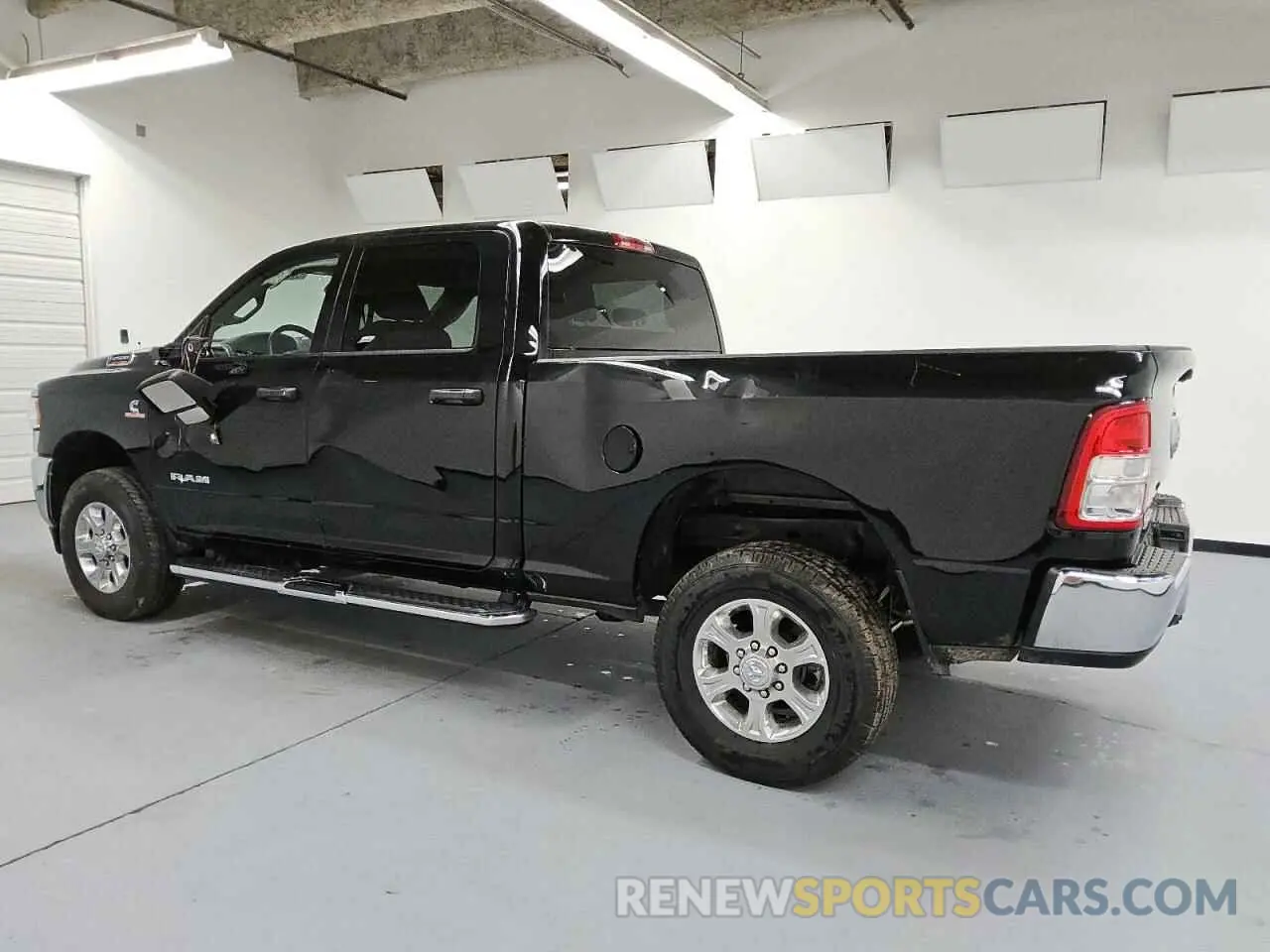 2 Photograph of a damaged car 3C6UR5DL1RG153608 RAM 2500 2024