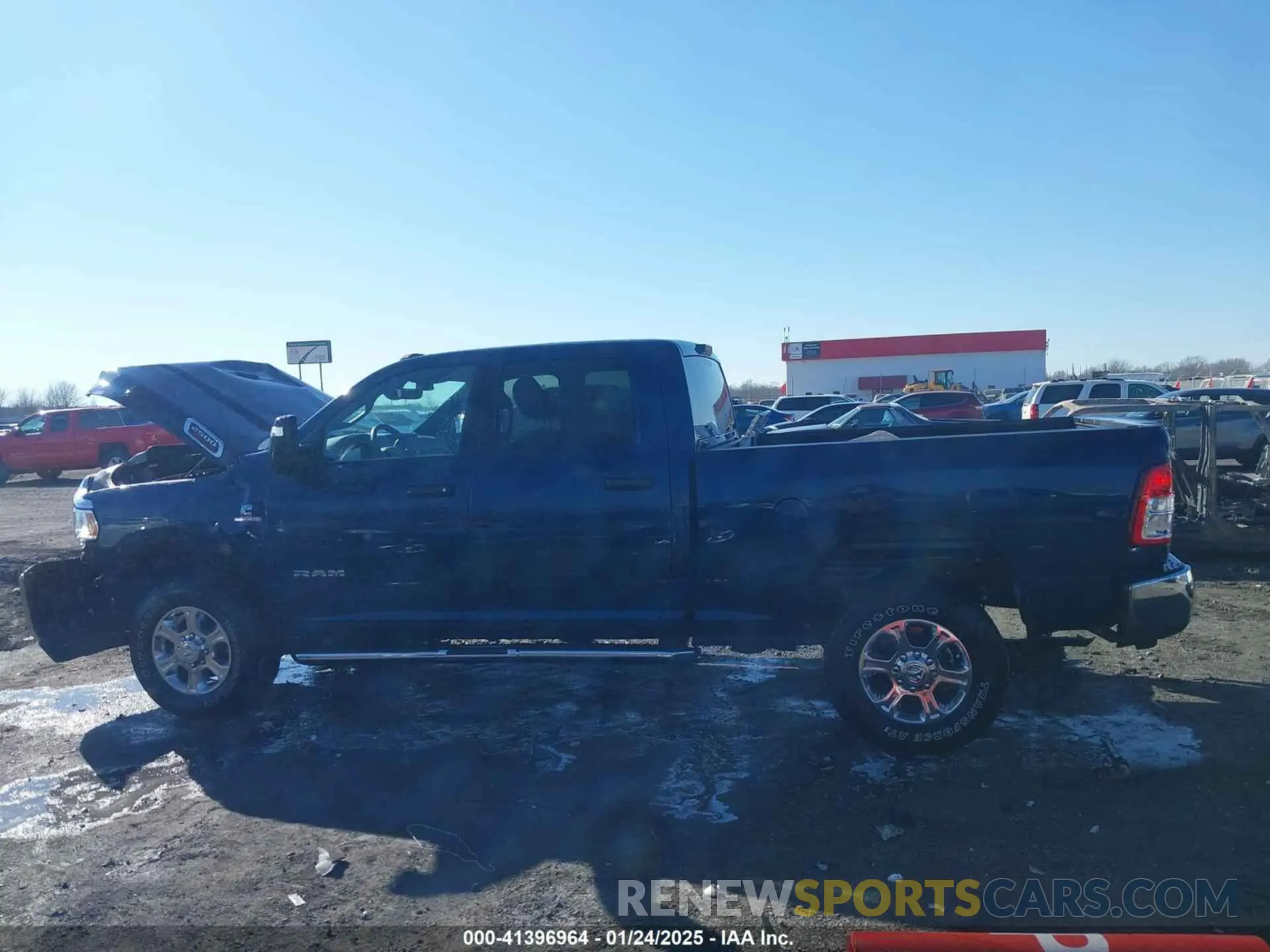 14 Photograph of a damaged car 3C6UR5DL1RG235886 RAM 2500 2024