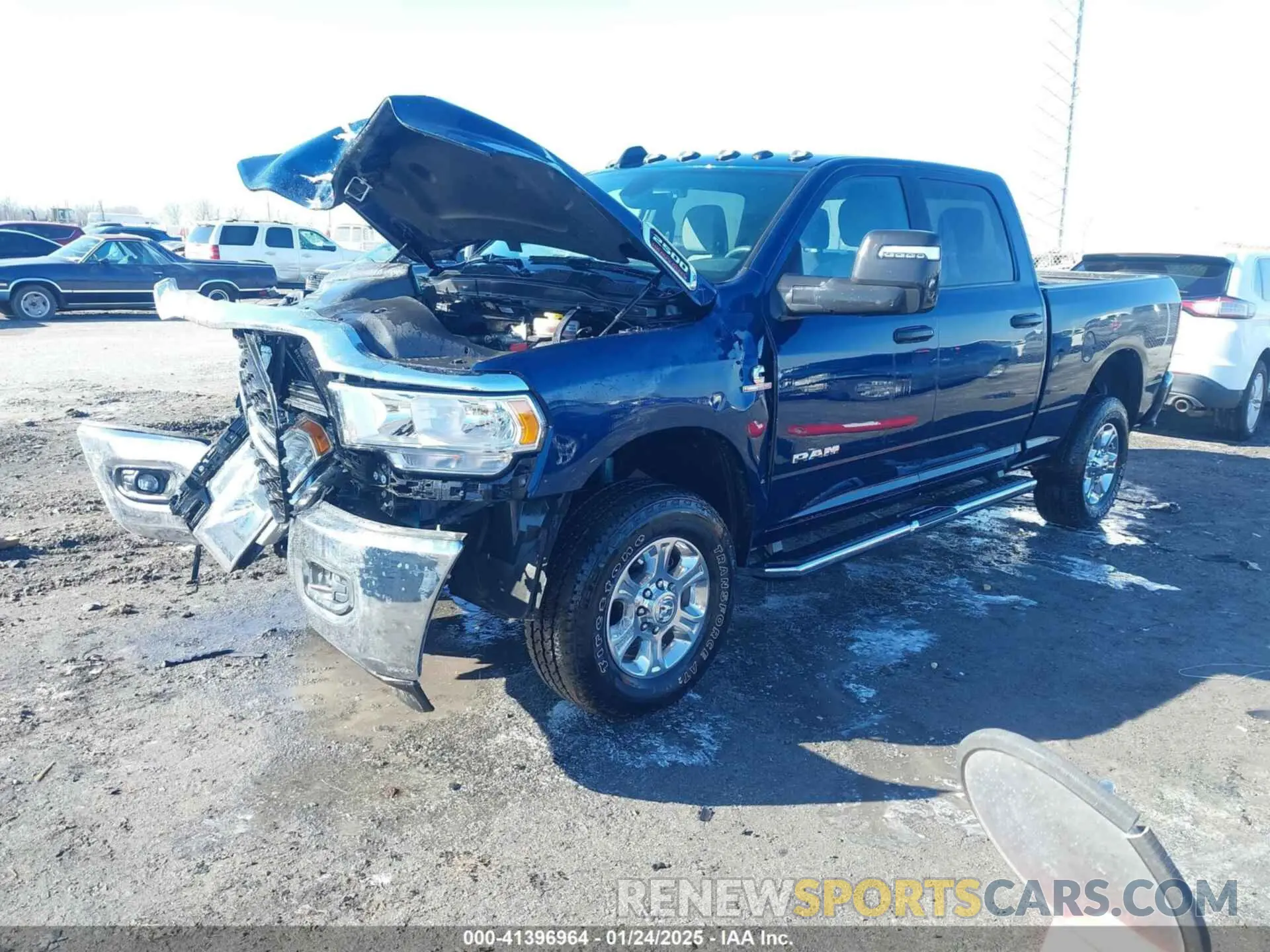2 Photograph of a damaged car 3C6UR5DL1RG235886 RAM 2500 2024