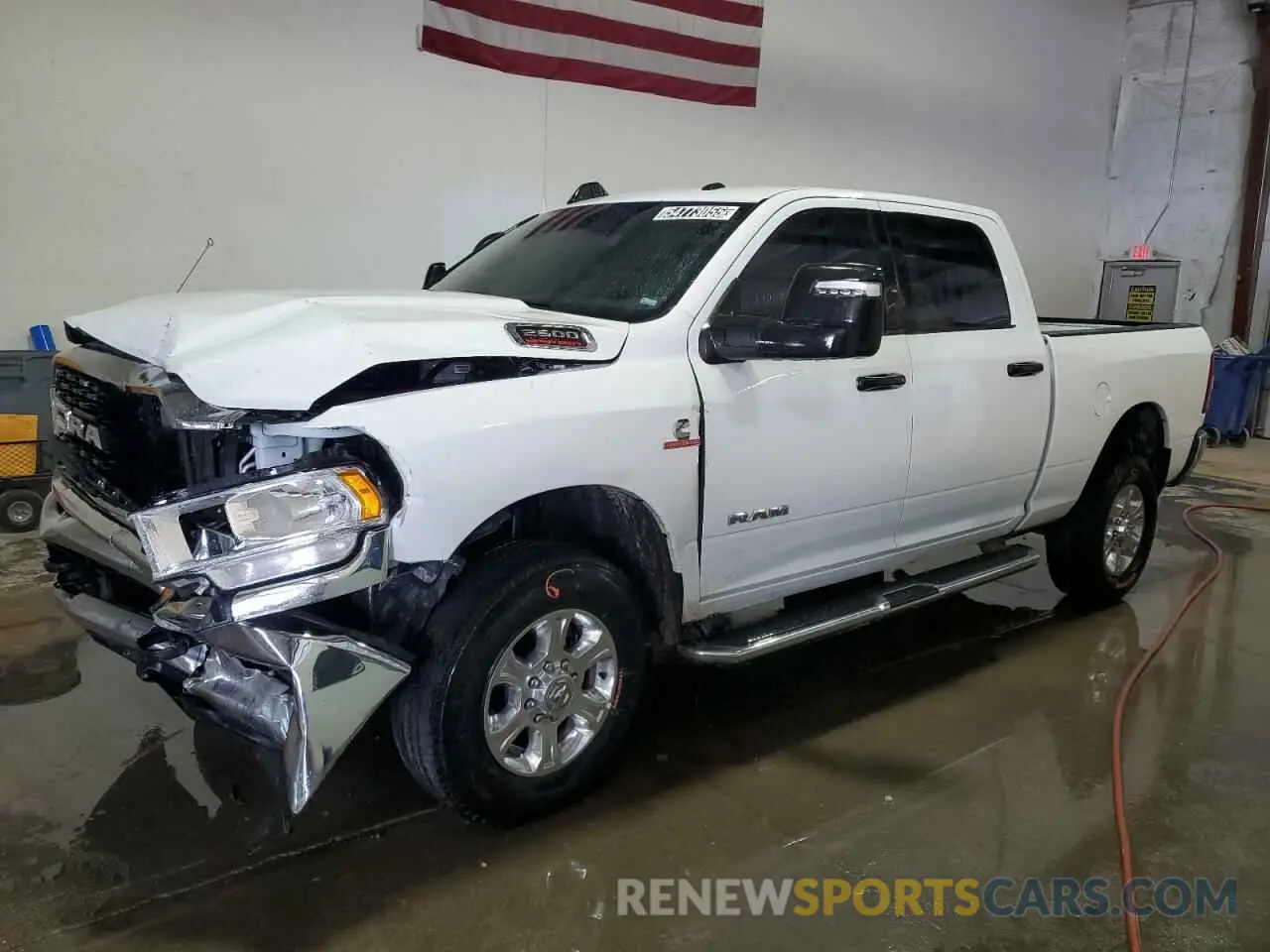 1 Photograph of a damaged car 3C6UR5DL1RG266801 RAM 2500 2024