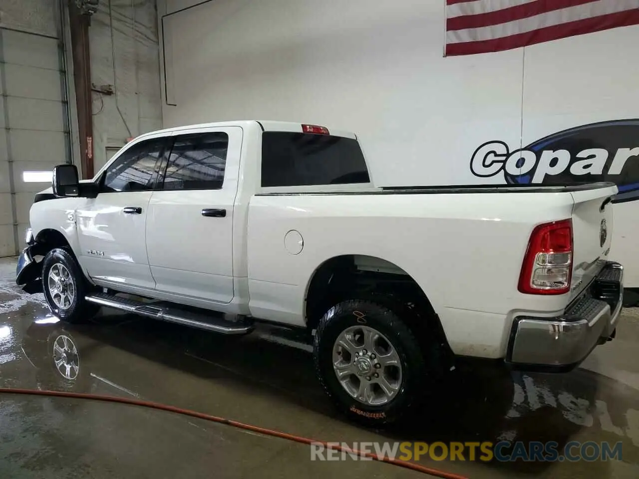 2 Photograph of a damaged car 3C6UR5DL1RG266801 RAM 2500 2024