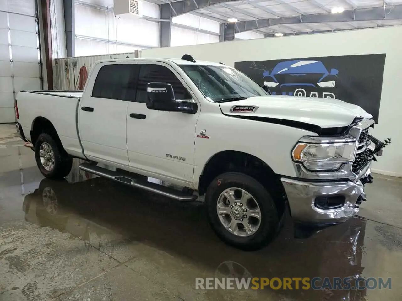 4 Photograph of a damaged car 3C6UR5DL1RG266801 RAM 2500 2024
