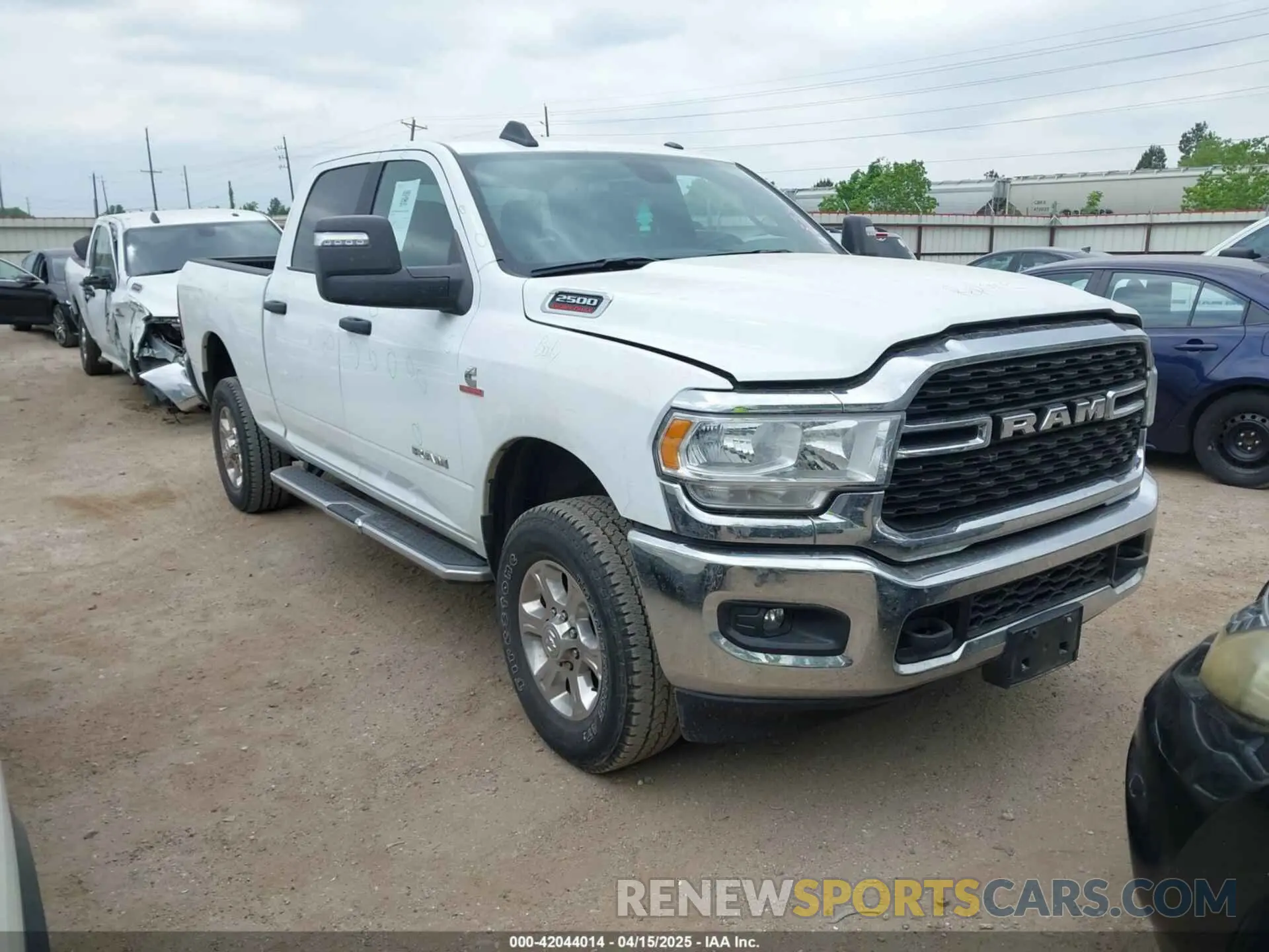 1 Photograph of a damaged car 3C6UR5DL1RG296302 RAM 2500 2024