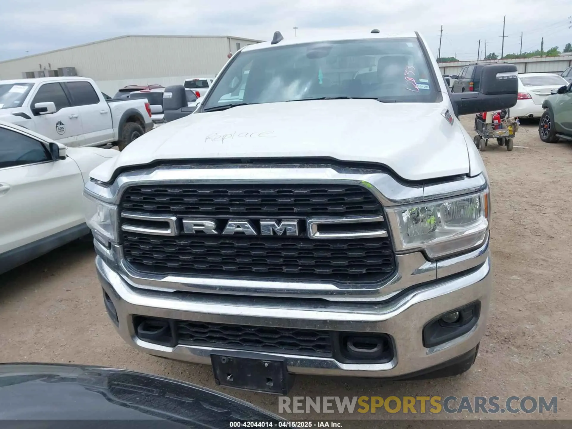 12 Photograph of a damaged car 3C6UR5DL1RG296302 RAM 2500 2024